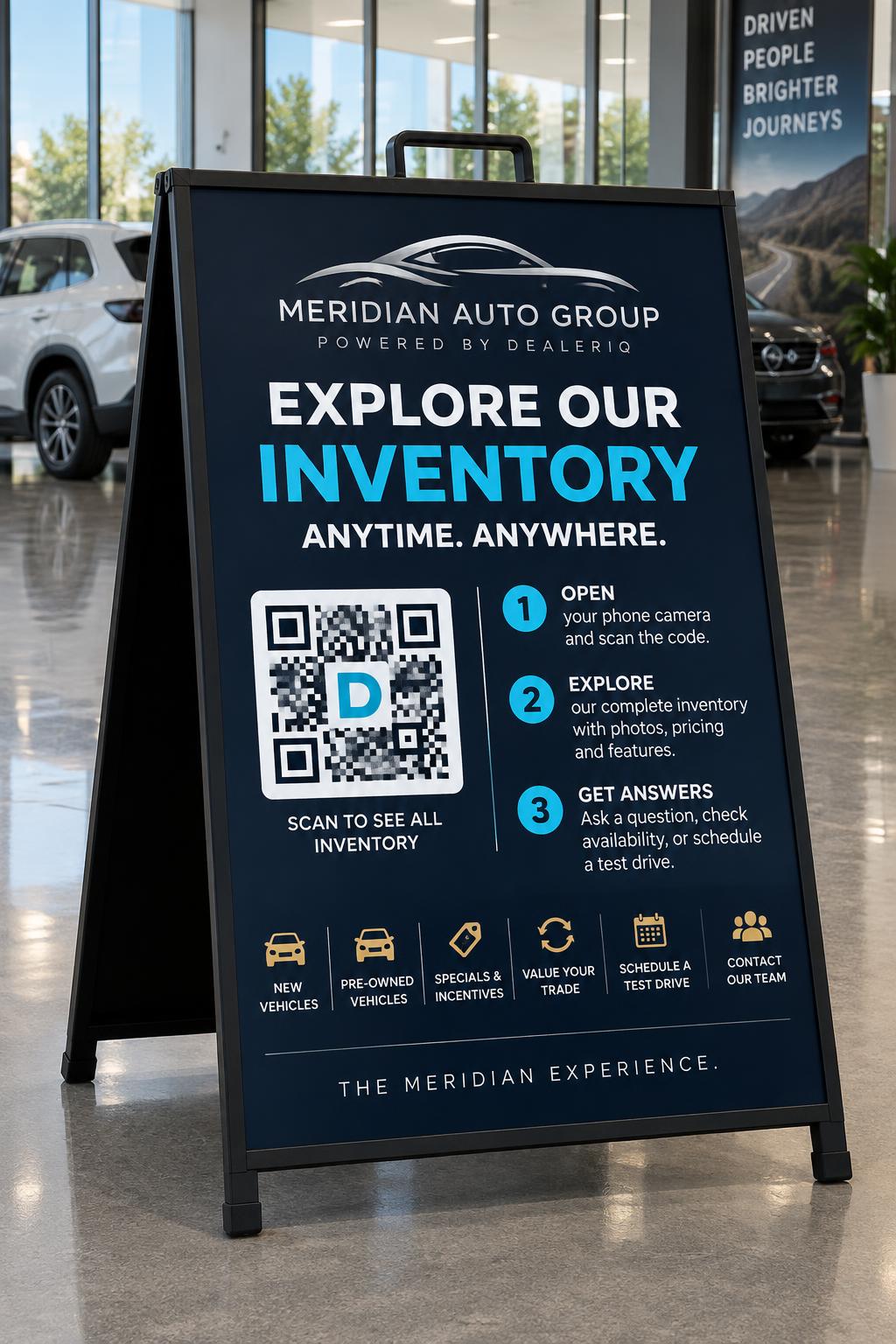 A sidewalk A-frame sign for Meridian Auto Group inviting shoppers to scan a QR code